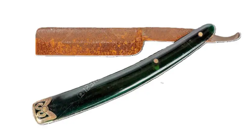 shaving with a rusted razor